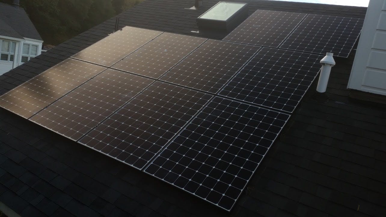 Solar Panels on Black Residential Roof